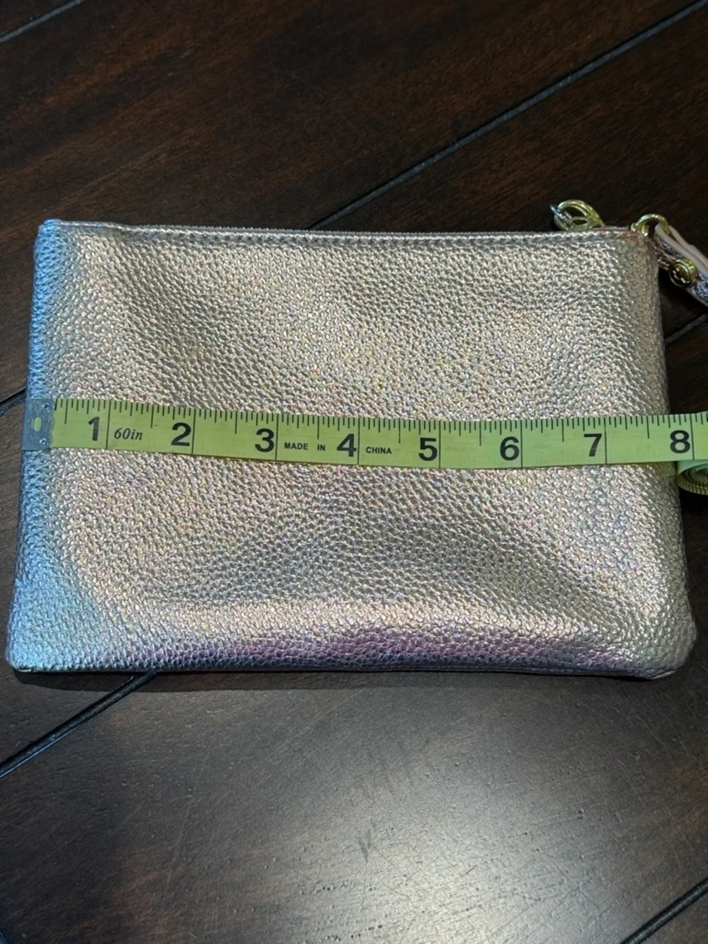 Francesca’s Rose Gold Clutch Wristlet